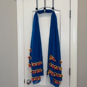 Bindya scarf.  3 rows of pompoms on the sides